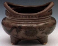 (明)崇祯紫金釉加彩龙纹三足炉“大明崇祯年制”款